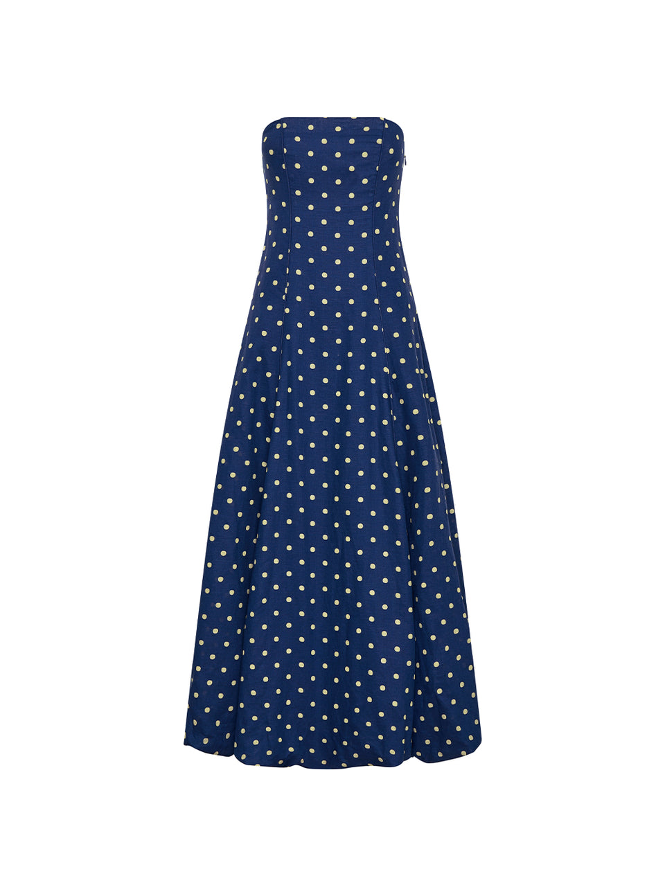 Navy strapless dress with white polka dots on a white background