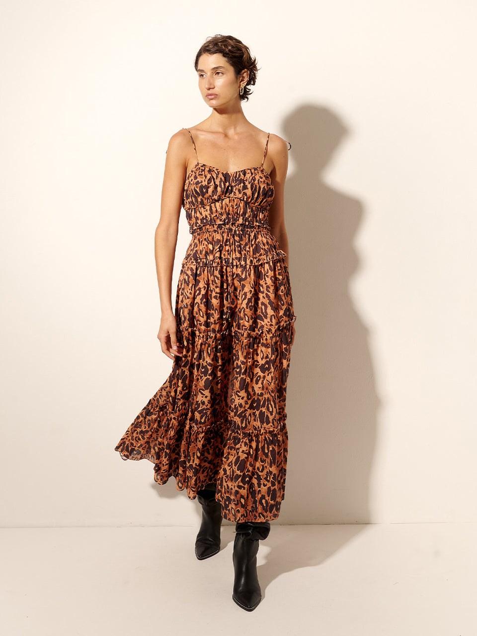 Madison Midi Dress KIVARI | Model wears orange and brown leopard midi dress
