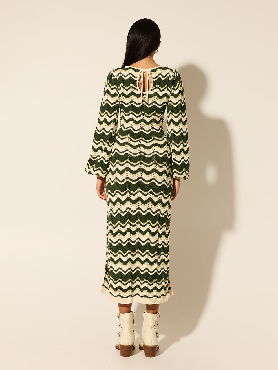 Marcella Knit Midi Dress KIVARI | Model wears green and cream knit midi dress back view