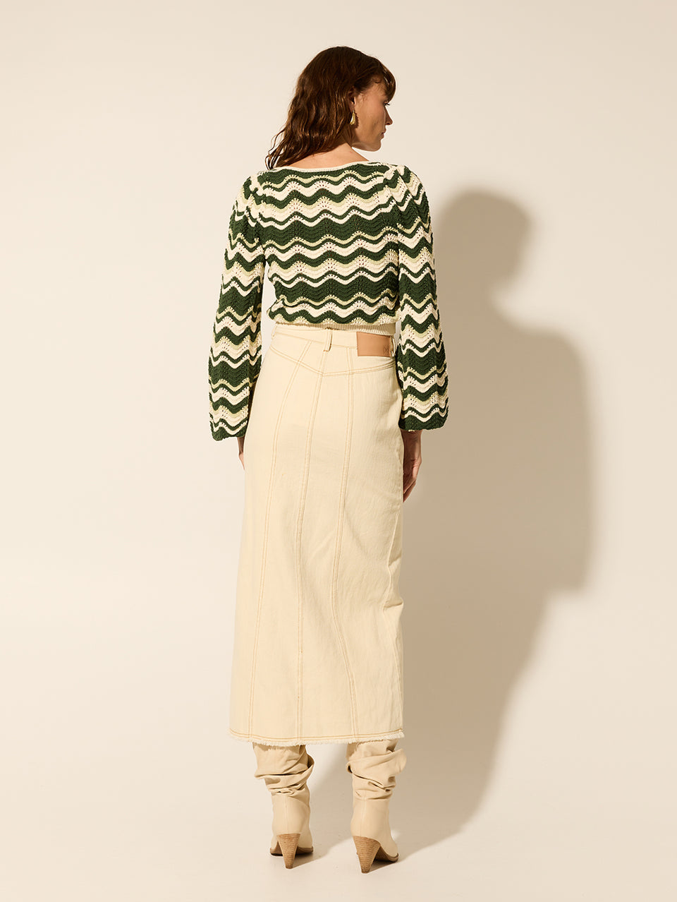 Marcella Knit Top KIVARI | Model wears green and cream knit top back view