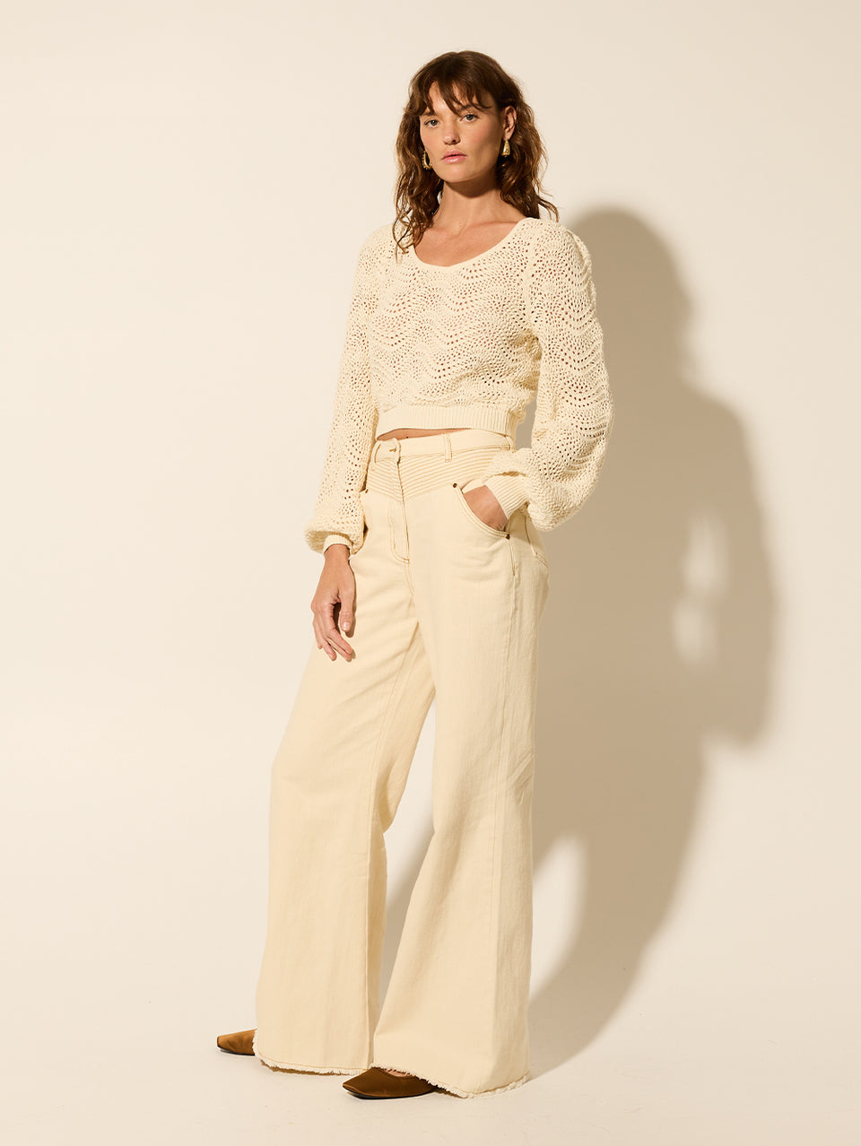 Mariana Knit Top KIVARI | Model wears cream knit top side view