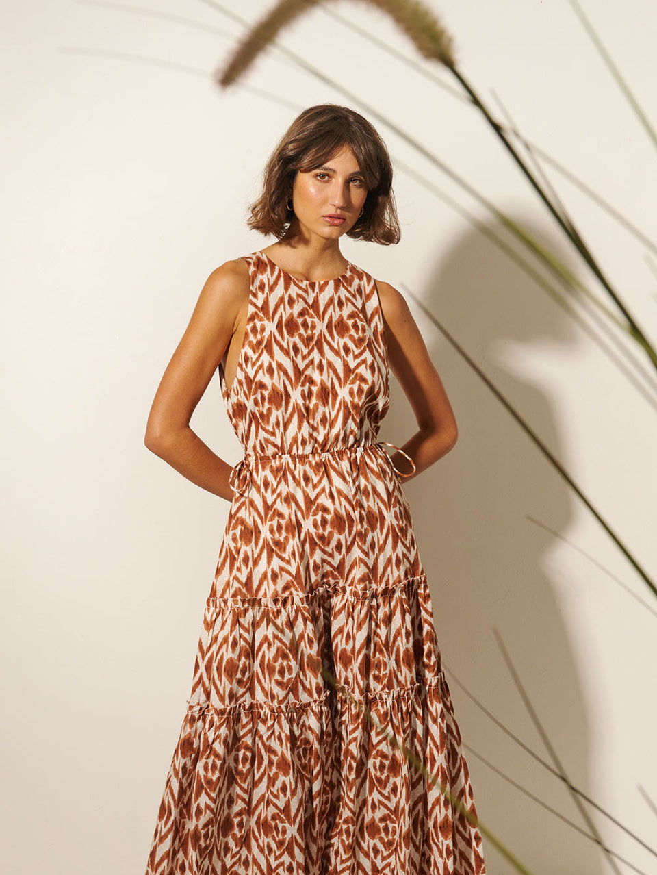 Marisa Cut Out Maxi Dress KIVARI | Model wears brown and ivory aztek printed cut out maxi dress