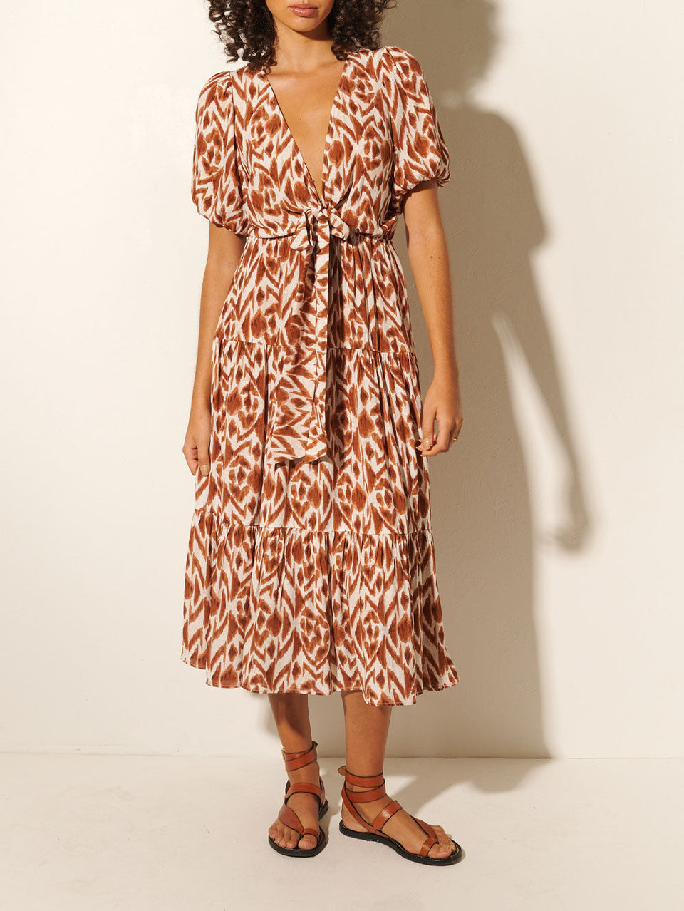 Marisa Tie Front Midi Dress KIVARI | Model wears brown and ivory aztek printed midi dress 