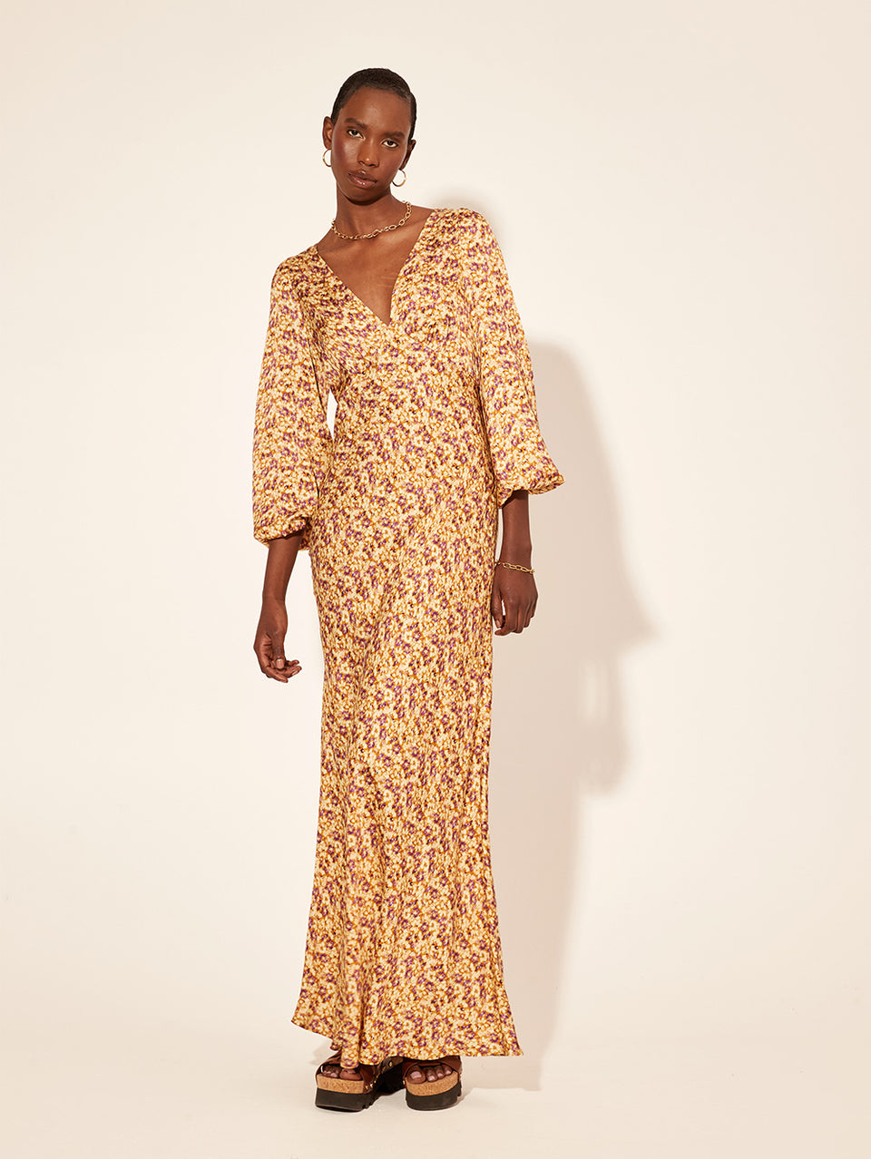 Mia Bias Cut Maxi Dress KIVARI | Model wears orange and purple ditsy printed maxi dress