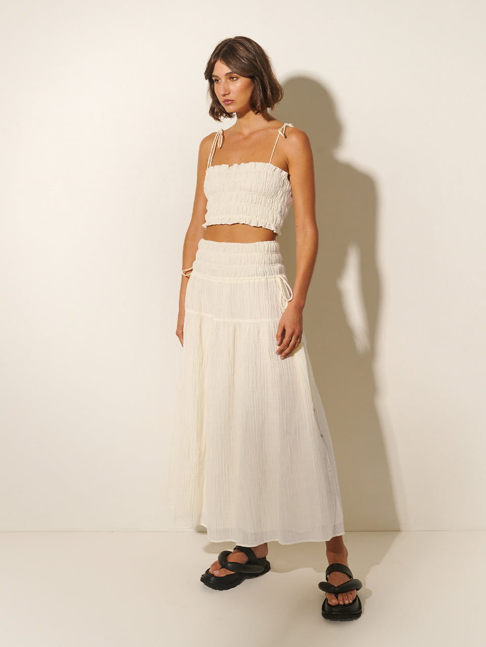 Nora Crop Top KIVARI | Model wears ivory crop top with matching skirt