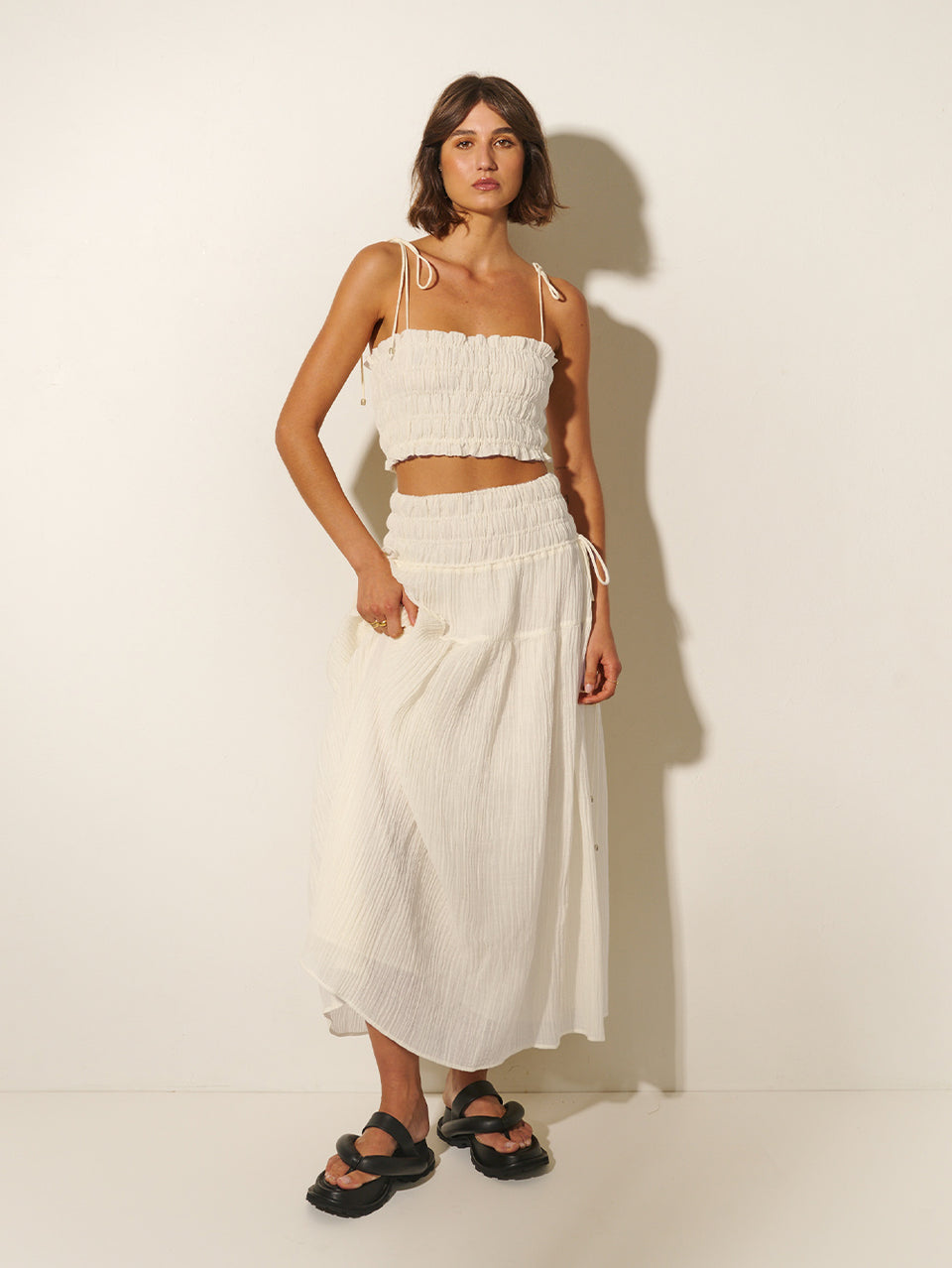 Nora Crop Top KIVARI | Model wears ivory crop top with matching skirt 