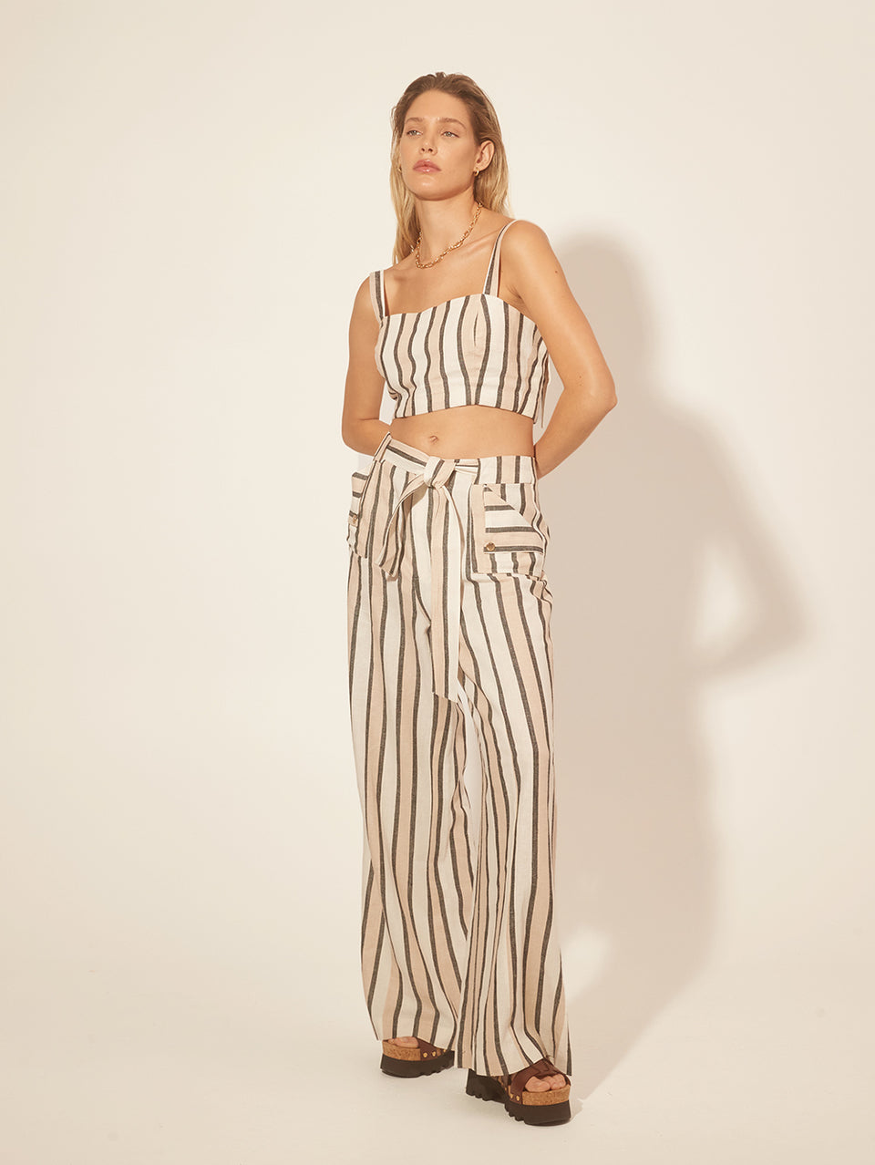 Oaklee Pant KIVARI | Model wears stripe pant side view