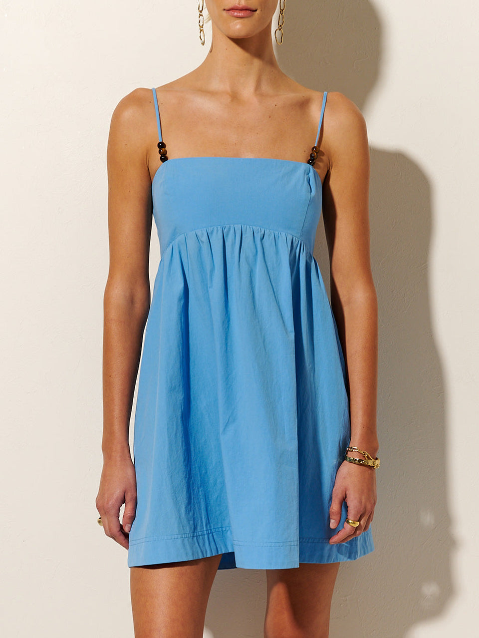 Oasis Mini Dress KIVARI | Model wears blue mini dress close up