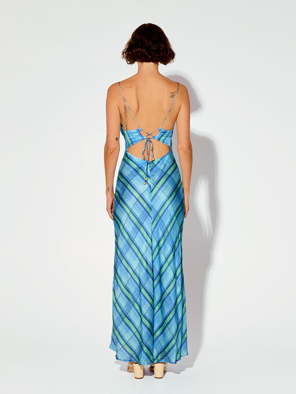 Oceana Slip Dress KIVARI | Model wears blue check print slip dress back view
