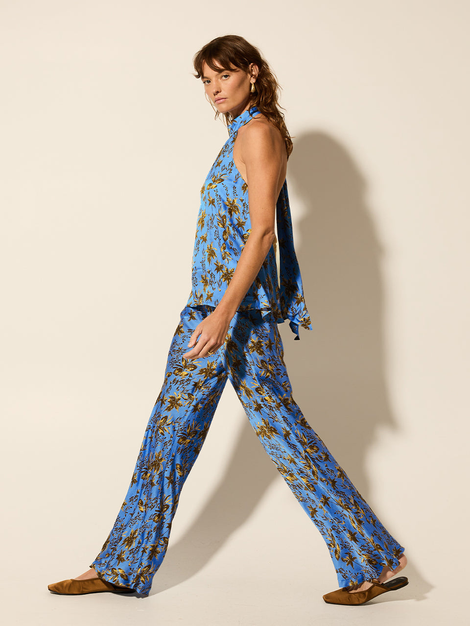 Paola Halter Top KIVARI | Model wears blue halter top side view