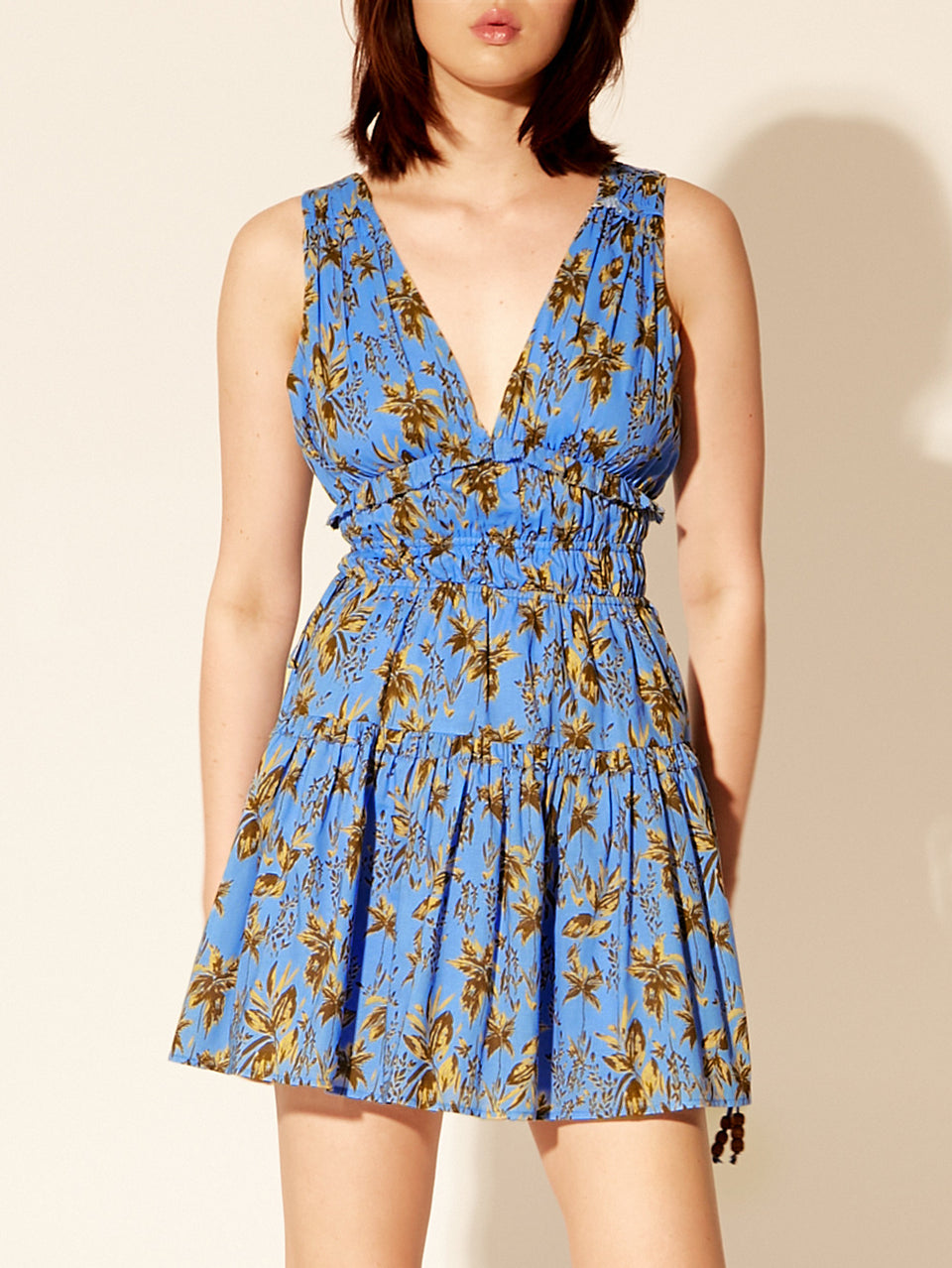 Paola Mini Dress KIVARI | Model wears blue mini dress close up