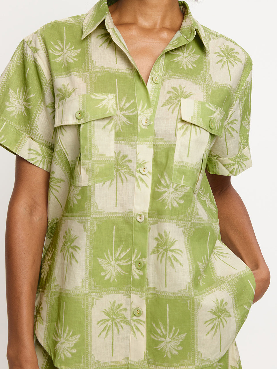 Paradiso Shirt KIVARI | Model wears palm tree printed shirt detail shot