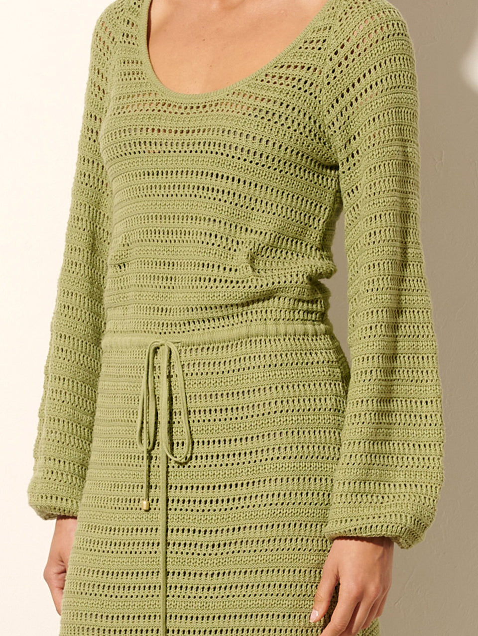Pepe Knit Dress Avocado KIVARI | Model wears avocado green knit maxi dress close up