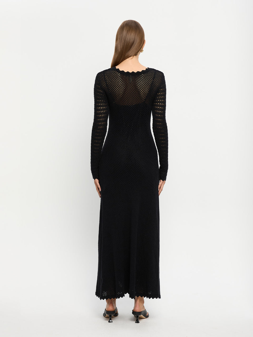 Ingrid Midi Dress Black KIVARI | Model wears black knit midi dress