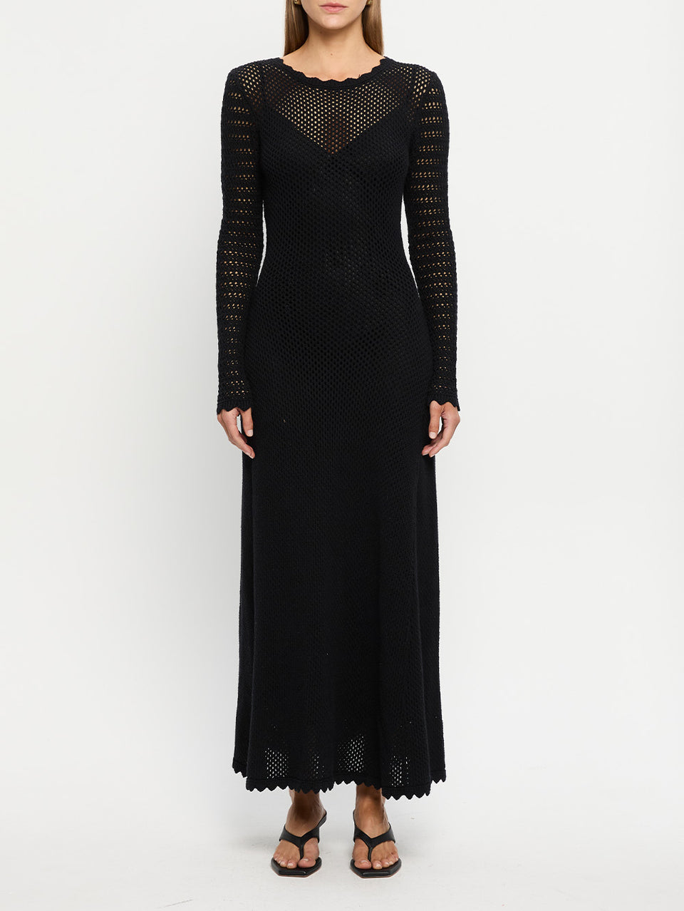 Ingrid Midi Dress Black KIVARI | Model wears black knit midi dress