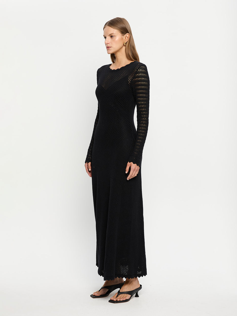 Ingrid Midi Dress Black KIVARI | Model wears black knit midi dress