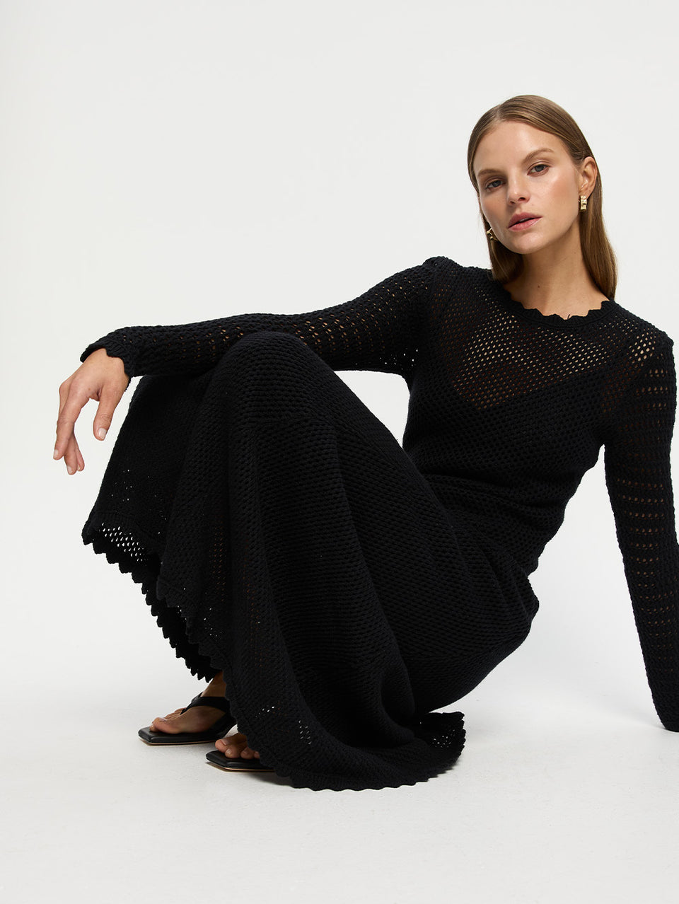 Ingrid Midi Dress Black KIVARI | Model wears black knit midi dress