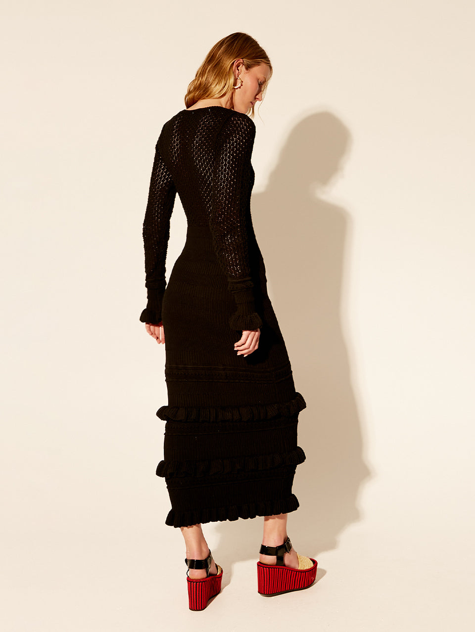 Rafaela Knit Maxi Dress KIVARI | Model wears black knit maxi dress back view