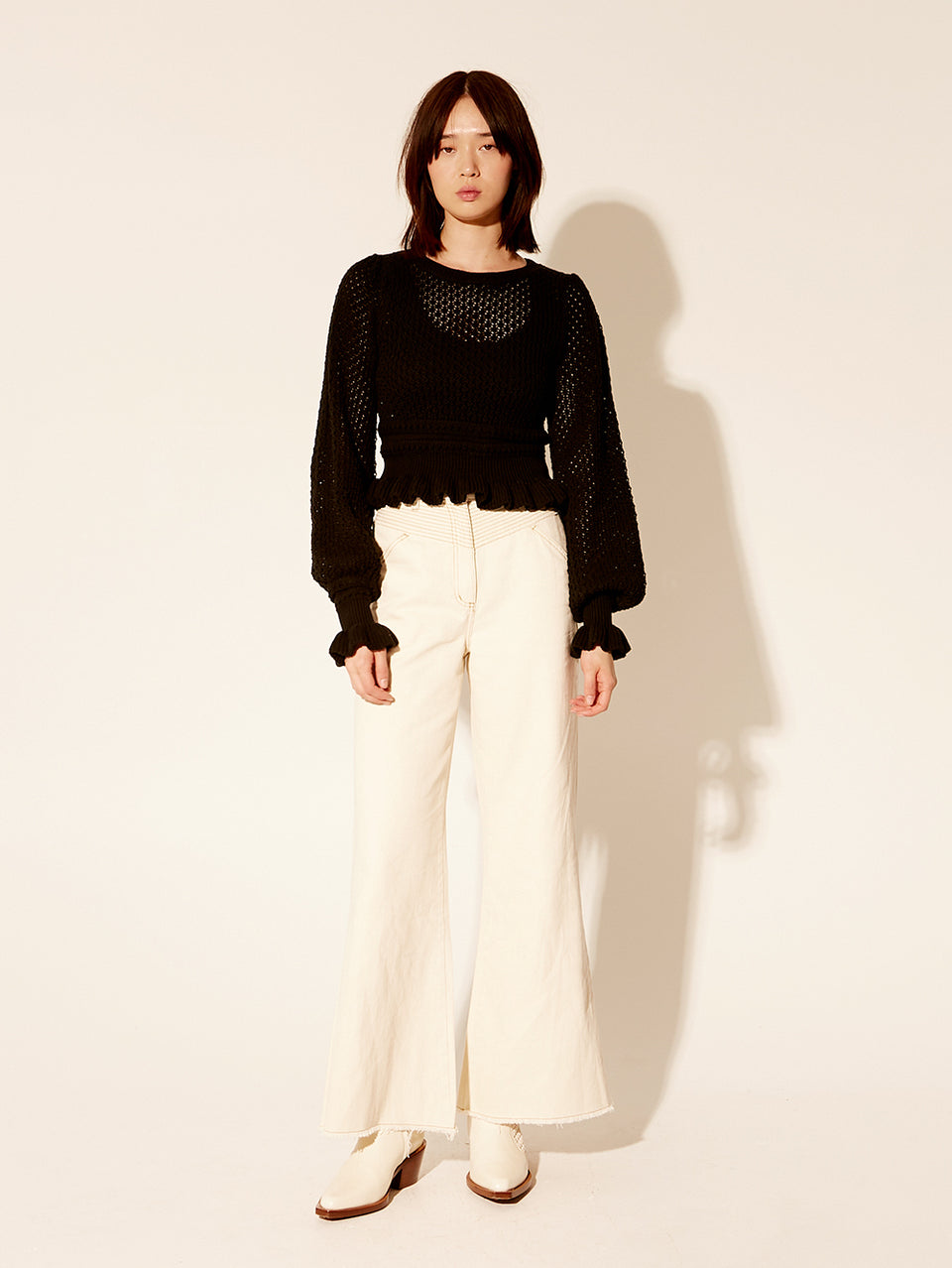 Rafaela Knit Top KIVARI | Model wears black knit top