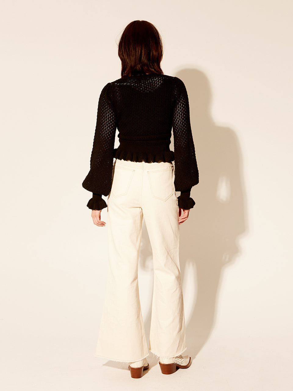 Rafaela Knit Top KIVARI | Model wears black knit top back view