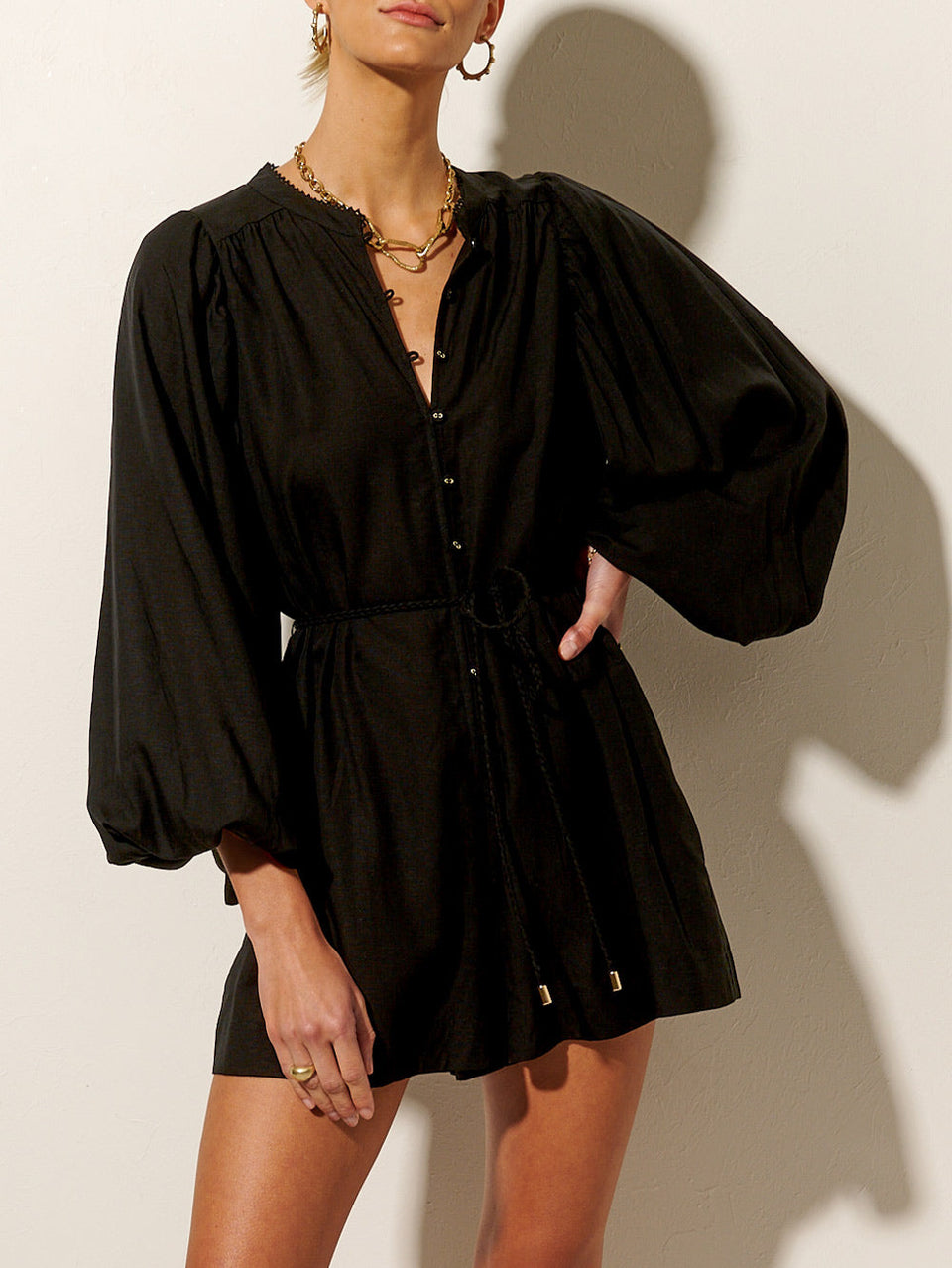 Raquelle Playsuit KIVARI | Model wears black long sleeve playsuit 