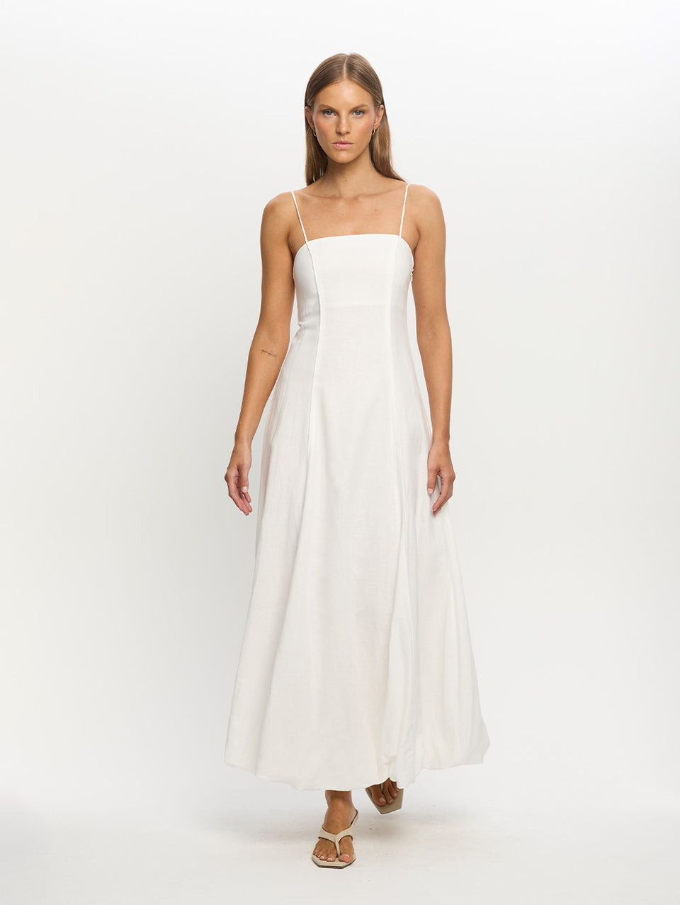 Woman in White Long Dress on Beach 