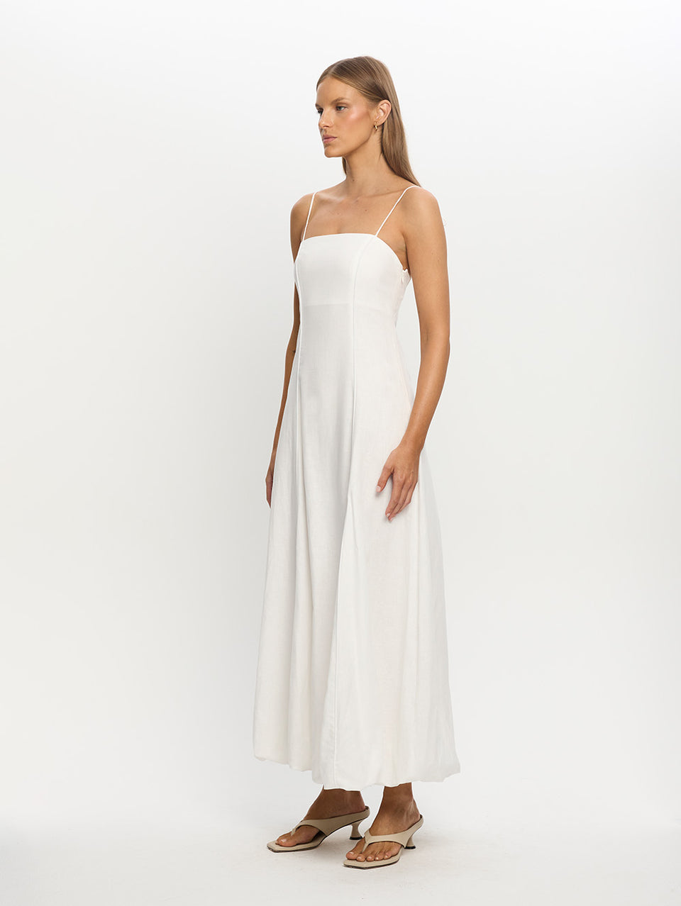 Woman in White Long Dress on Beach 