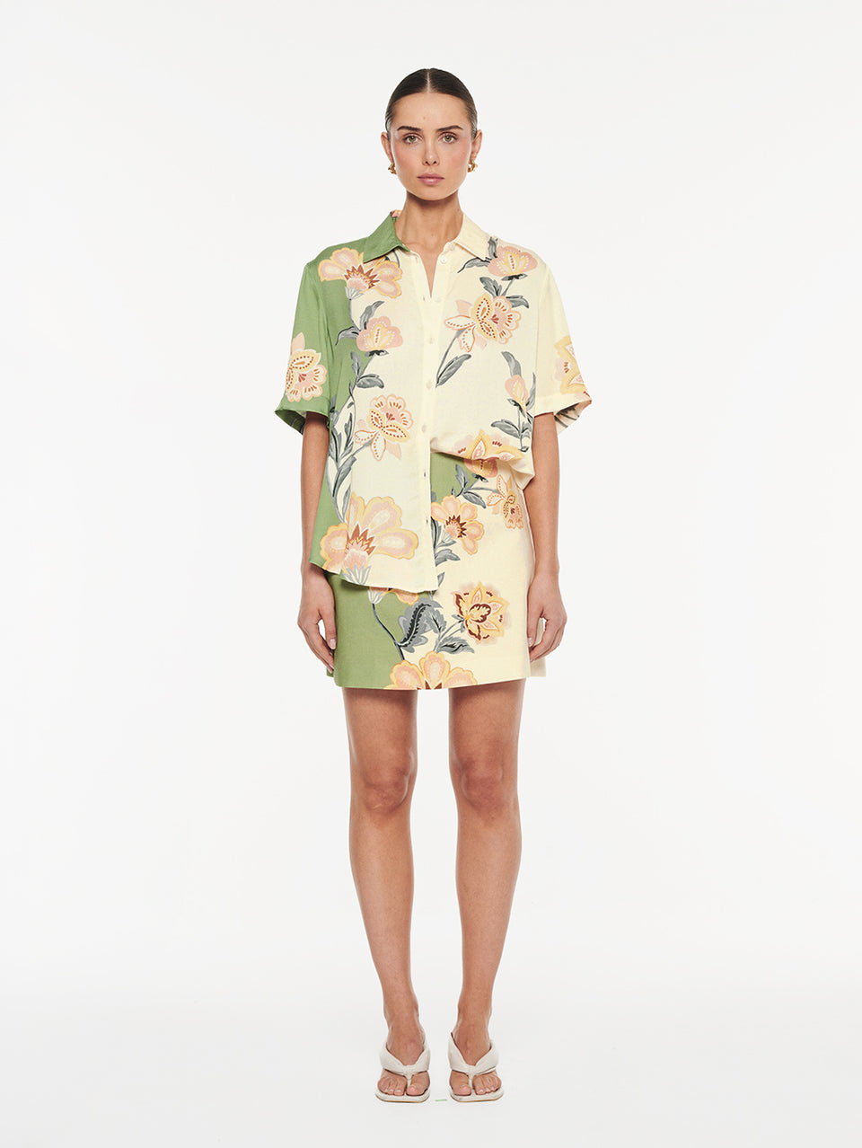 Lotte Shirt in Green Cream, front view of matching floral print shirt and mini skirt set
