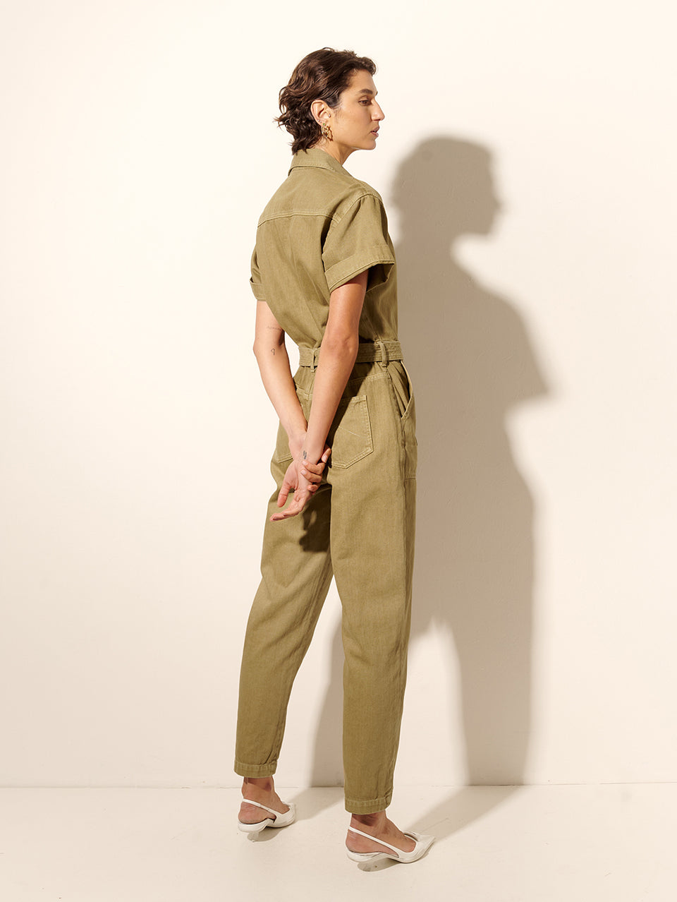 Tahlia Boilersuit Khaki KIVARI | Model wears khaki green denim boilersuit back view