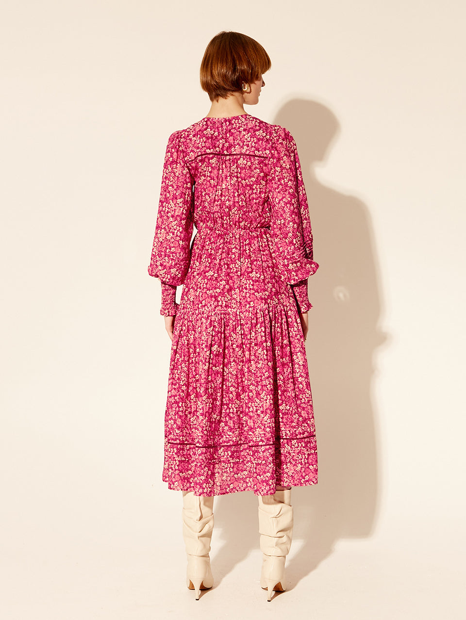 Tamara Midi Dress KIVARI | Model wears pink floral long sleeve midi dress back view