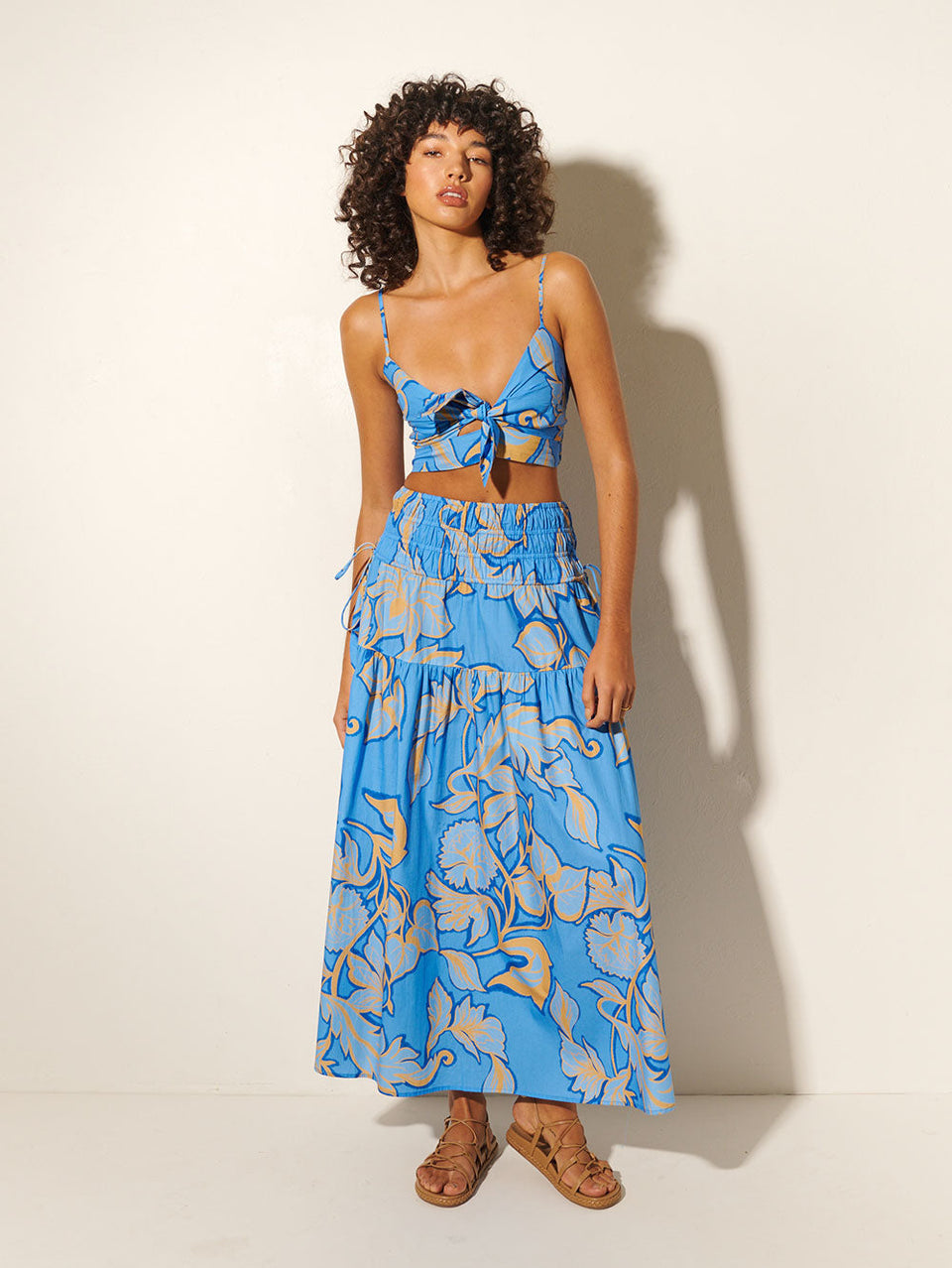 Taniana Crop Top KIVARI | Model wears blue floral crop top with matching skirt 