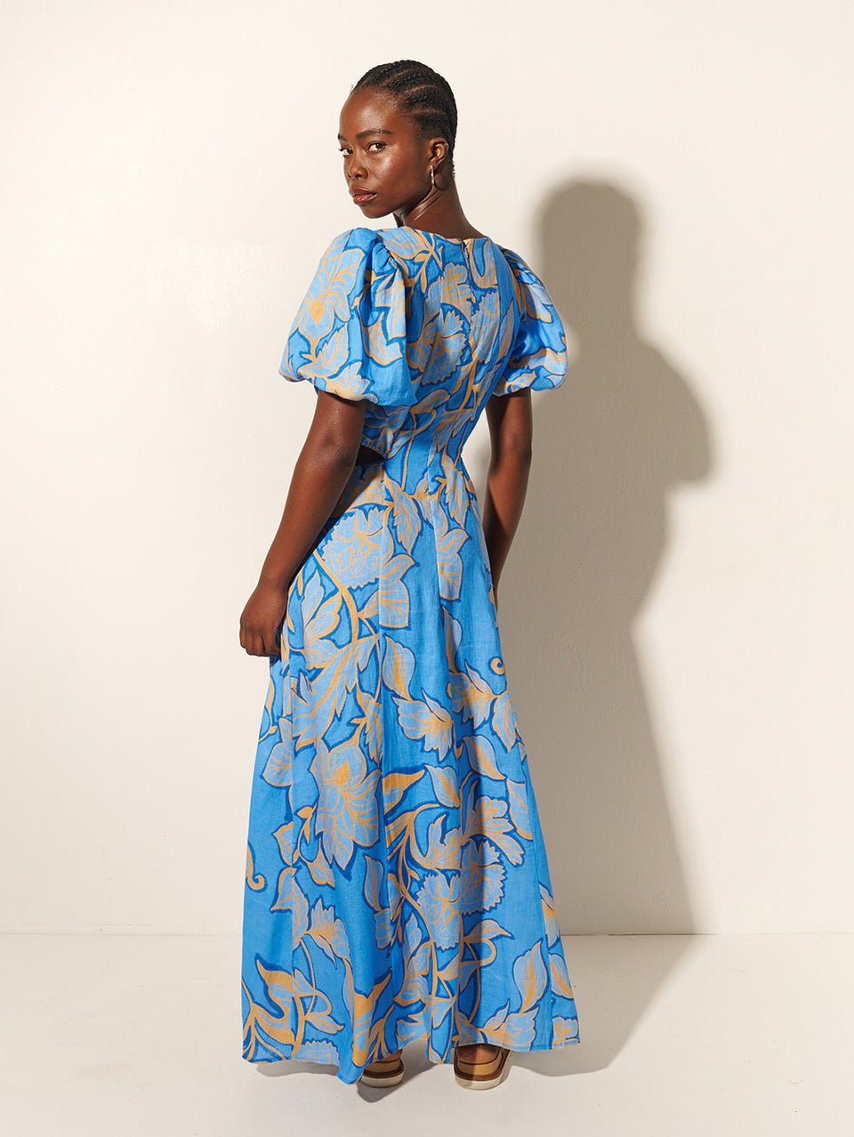 Taniana Cut Out Maxi Dress KIVARI | Model wears blue and orange floral maxi dress back view