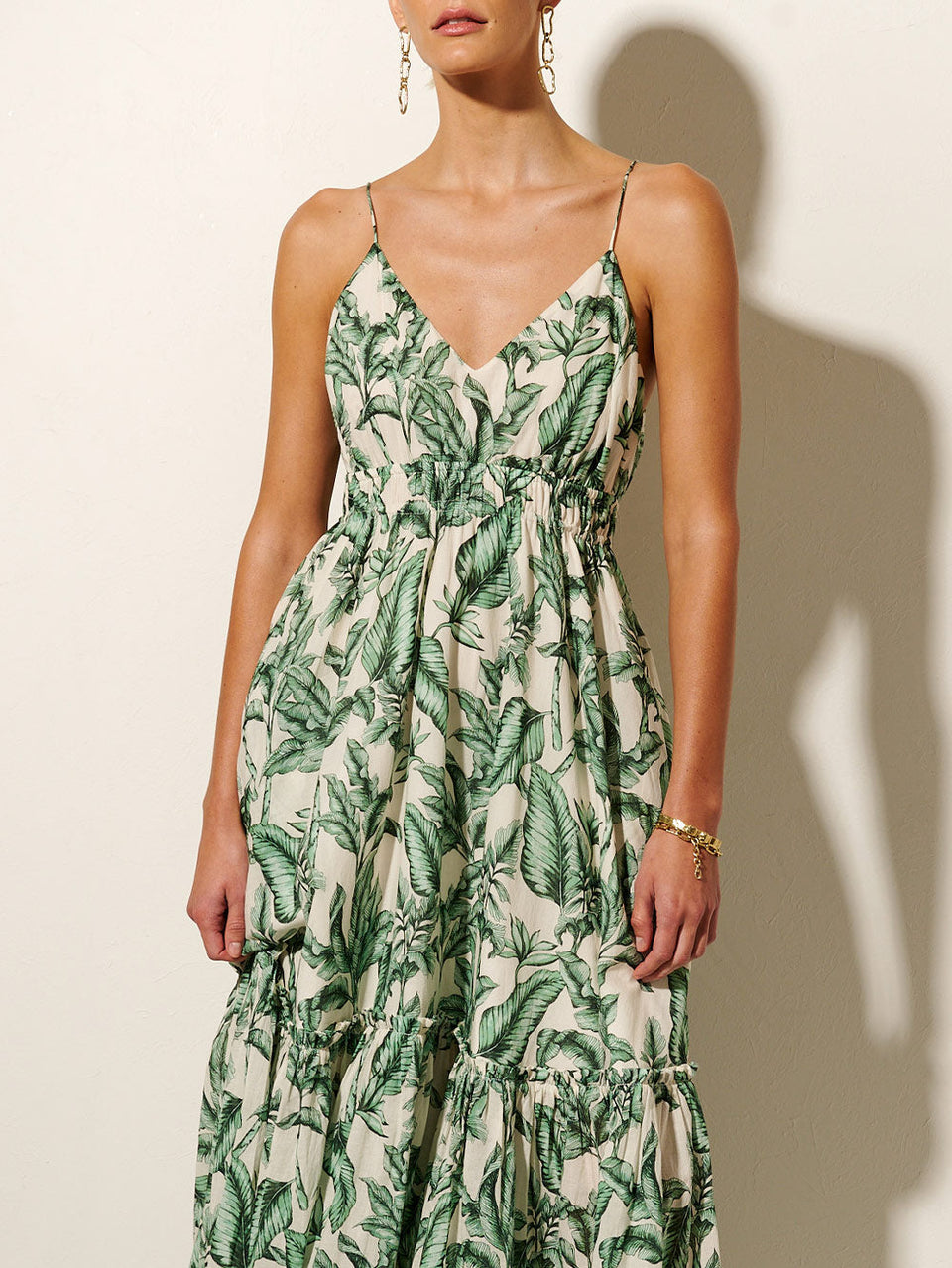 Tropico Maxi Dress KIVARI | Model wears palm leaf printed maxi dress close up