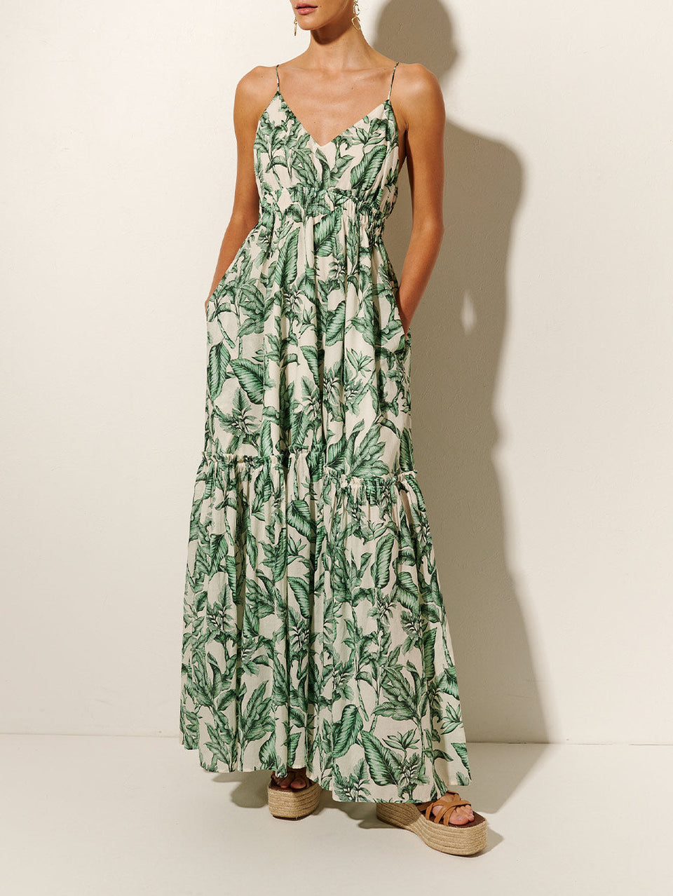 Tropico Maxi Dress KIVARI | Model wears palm leaf printed maxi dress