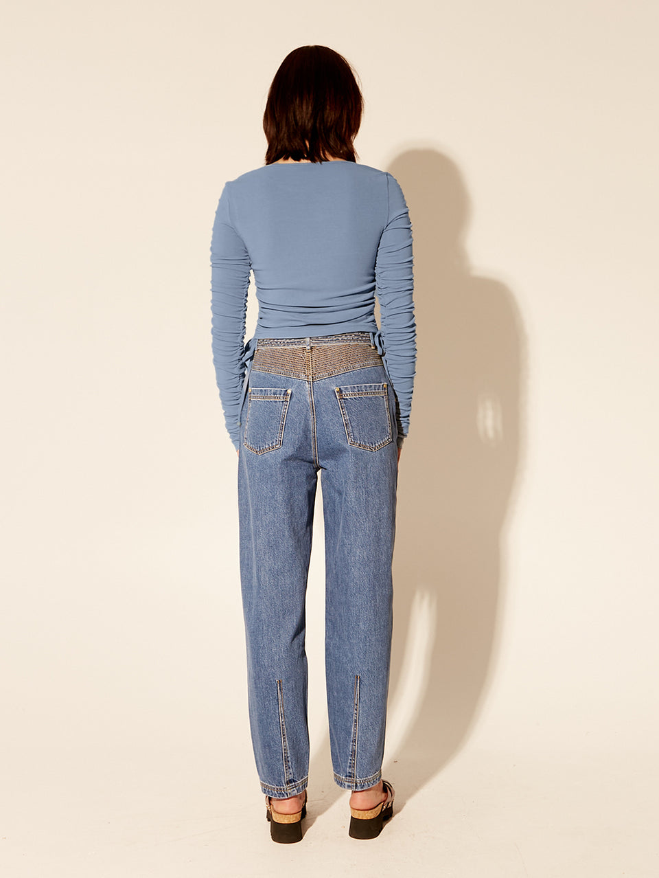 Vanessa Top KIVARI | Model wears blue top back view